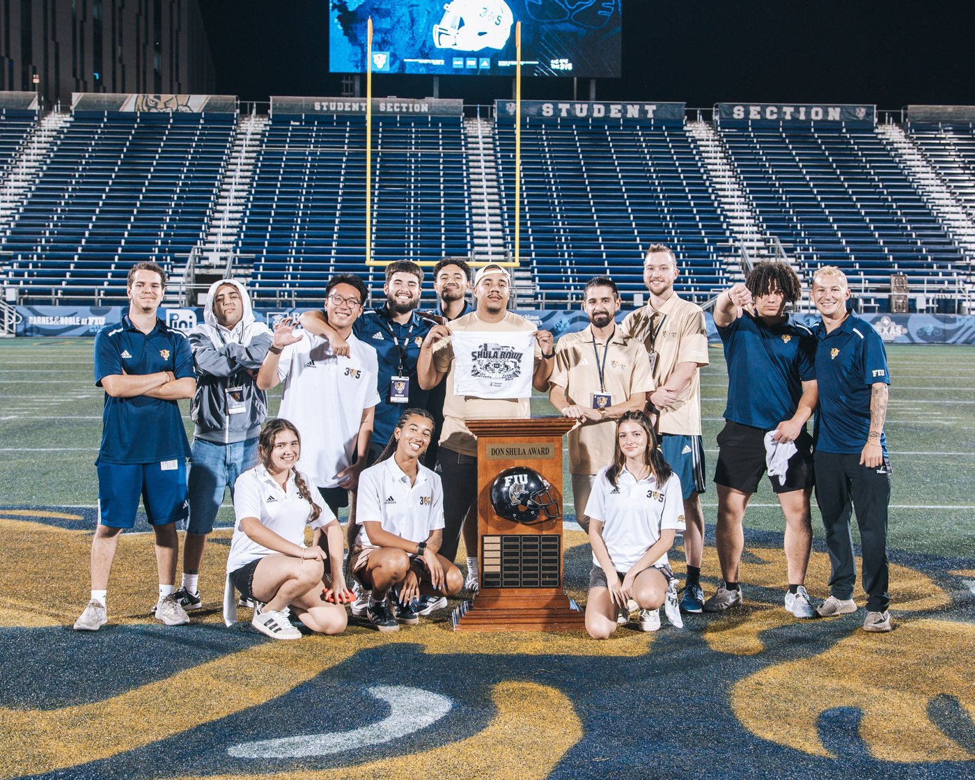 The FIU creative team with the Don Shula Award trophy